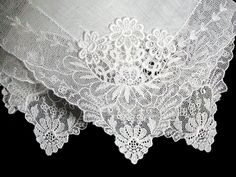 New old stock vintage wedding hanky with a fancy applique and lace border. Although never used, this hanky is slightly imperfect. Please view all photos, as you will see a couple of very small tears in the lace and a small tear in the linen center. Still very pretty, and perfect for a bride-to-be as her something old. All white, measuring 11 inches, and made of linen. Being sold AS IS, and priced accordingly. White Victorian Handkerchiefs With Lace Trim, White Victorian Handkerchief With Lace Trim, Victorian White Handkerchiefs With Lace Trim, Vintage Lace With Lace Trim For Ceremony, Elegant Lace Handkerchiefs With Lace Trim, Lace Wedding Handkerchiefs With Lace Trim, Lace Handkerchiefs With Lace Trim For Wedding, Elegant Wedding Handkerchief With Lace Work, Elegant Lace Wedding Handkerchief