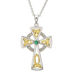 This cross is a nod to the Emerald Isle. The lush green gemstone is reminiscent of the Irish Countryside’s rolling hills. Emerald inspires confidence and has a calming effect on the wearer About the Trinity Knot Diamond & Emerald Silver Celtic Cross Pendant The Trinity Knot Diamond & Emerald Silver Celtic Cross Pendant is encrusted with diamonds and an emerald that depicts the true nature of the Celts. The cross has an intricate design featuring the Trinty knot in gold. The Trinity Knot is a Cel Persona Ideas, Emerald Cross, Celtic Crosses, Irish Ring Claddagh, Celtic Heritage, Celtic Trinity Knot, Crescent Moon Earrings, Trinity Knot, Irish Jewelry