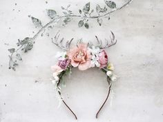 This beautiful antler headband is a lovely accessory, perfect for a party,  or wedding.  Our stunning faux flowers look like the real. Head circumference:  one size fits all (adjustable) / fits adults and older children If the crown should fit the baby, after buying please give head circumference Moose Horns, Fawn Headband, Deer Antler Headband, Antler Flower, Deer Antlers Headband, Horns Headband, Antler Headband, Horn Headband, Winter Headbands