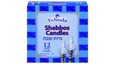 two candles with blue and white stripes are in a cardboard box on a white background