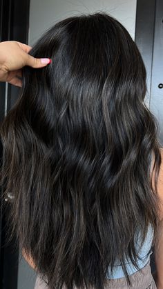 something subtle 🔥  ✍🏽 if you’re not high maintenance when it comes to your hair but you want to switch up your color, try a couple of shades lighter than your natural hair color for subtle yet impactful highlights  ✍🏽 these looks are considered lived in and sunkissed — they pair perfect with waves whether it’s smoothed out and bouncy or air dried with salt spray — waves in the hair show off dimension and make the lighter pieces stand out  ✍🏽 face framing highlights are created with impactful hair color in mind and can be created in a subtle way to grow out seamlessly for several months before requiring any maintenance Dark Hair With Subtle Highlights And Money Piece, Dark Black Hair With Dimension, Black To Blonde Transition, Dark Brown Dimensional Hair Subtle Highlights, Black Hair With Subtle Dimension, Lightened Black Hair, Rich Dark Brown Hair With Dimension, Dark Brown Hair With Dimension Natural, Super Dark Brown Hair With Highlights