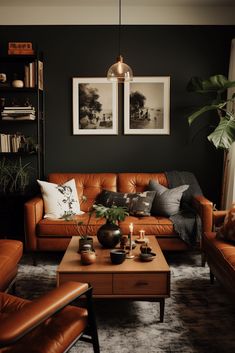 a living room with two couches, a coffee table and pictures on the wall