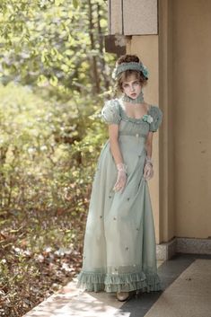 Experience the charm of the Romantic Mint Green Regency Era Embroidered Dress With Ruffle - Empire Waist Dress Plus Size. This exquisite dress is inspired by the elegance of Queen Charlotte gowns, capturing the essence of Bridgerton-inspired fashion.Crafted with meticulous attention to detail, this dress features delic Regency Era Fashion, Era Fashion, Op Dress, Regency Dress, Regency Fashion, Long Dress Design, Queen Charlotte, Regency Era, Empire Waist Dress