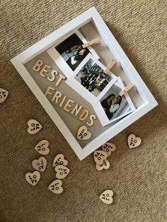 the best friends frame is surrounded by wooden hearts