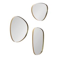 three oval mirrors are shown against a white background, one is gold and the other is silver