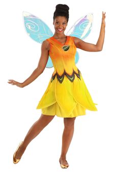 a woman in a yellow and blue fairy costume