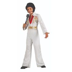 a boy in elvis costume holding a microphone