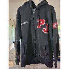 Rare Pj Hoodie. Please See Condition In Pictures. Be Glad To Answer Any Questions. Black Athleisure Hoodie With Embroidered Logo, Black Fleece Hoodie With Embroidered Logo, Black Hoodie With Embroidered Logo For Winter, Black Varsity Hooded Jacket With Long Sleeves, Black Varsity Hooded Jacket For Streetwear, Black Cotton Hooded Jacket For College, Casual Black Hooded Jacket For College, Urban Black Hooded Jacket For College, Black College Hoodie With Embroidered Logo