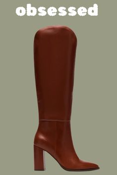 Brown red tall boot. Classic style and fit