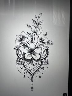 a black and white drawing of flowers in a vase on a glass door with water drops