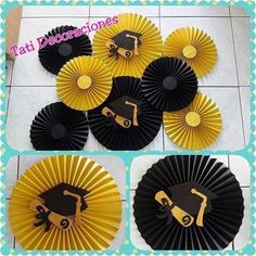 some black and yellow paper fans with construction vehicles on them in the shape of graduation caps