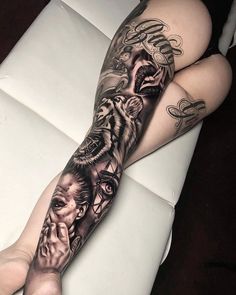 a woman's leg with tattoos on it