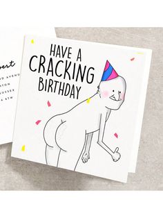 two greeting cards with an image of a dog wearing a party hat and the words have a cracking birthday written on it