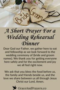 a sign that says, a short prayer for a wedding rehearal dinner with two hearts