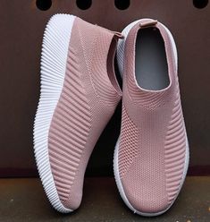 This mesh slip-on sneaker brings you the best of both worlds - comfort and style. Featuring a thick rubber sole and lovely lined pattern. Pair with your favorite jeans, joggers or shorts. Comes in eight fabulous colors from which to choose. Cheap Womens Shoes, Women Slip On Sneakers, Comfortable Walking Shoes, Spring Sneakers, Sneakers Looks, Summer Sneakers, Slip On Flats, Sport Shoes Women, Casual Flat Shoes