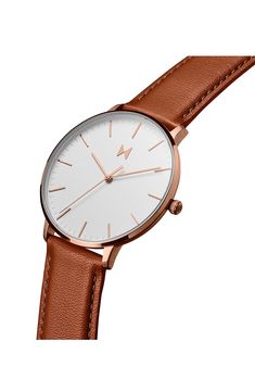 A wide-face watch feels light on the wrist thanks to the slim design complemented by its clean, minimalist dial marked by slender stick indexes and hands. Style Name:Mvmt Legacy Slim Leather Strap Watch, 42mm. Style Number: 6203907. White Leather Strap Watch For Everyday Use, White Watch With Leather Strap For Everyday, Minimalist White Everyday Watch, White Minimalist Everyday Watch, Minimalist Everyday Watch With Leather Strap, Brown Minimalist Watches For Business, Brown Minimalist Watch For Business, Modern White Leather Watch, Minimalist Brown Business Watches