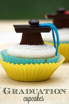 graduation cupcakes with white frosting and chocolate on top