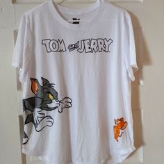 Nwot Woman’s Junior Size Xxl White T-Shirt, Tom And Jerry. This Shirt Has Never Been Worn, I Bought It But It Was To Small For Me, I Took The Tags Off Before Trying It On. So It Just Sat In My Closet, No Rips Or Stains Or Tears. Fun White Tops For Loungewear, White Tops With Funny Print For Loungewear, T Shirts Oversized, Shirts Oversized, Tom And Jerry, White T Shirt, White Tshirt, White T, Womens Tops