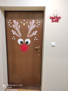 a door decorated to look like a reindeer