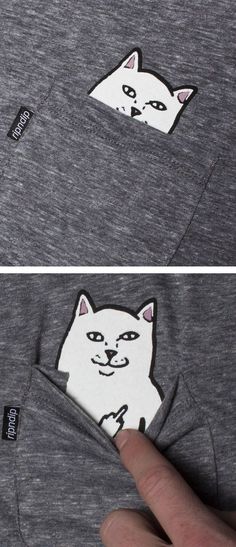 the cat is sticking its head out of the pocket of a t - shirt that has an image of a cat on it