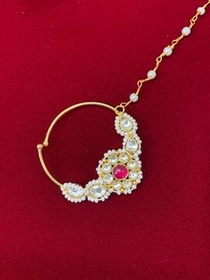 Luxury bridal nose ring. 24k gold plated , brass made kundan nose ring. For non pierced nose or pierced nose. Very light weight. About 1.5 inch diameter. Kundan Nath, Nath Nose Ring, Bridal Nose Ring, Pierced Nose, Luxury Bridal, Ruby Ring, Nose Piercing, Ruby, Gold Plate