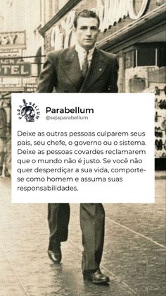 a man in a suit and tie walking down the street with a sign that says parabellum