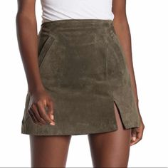 This Skirt Is Brand New With The Tags! It’s A Size 26 And The “Herb” Color Is An Olive Green! It’s 100% Leather- The Soft Suede Style Is So Stylish And Very Flattering! It Has To Pockets In The Front Of The Skirt, As Well! Casual Skirted Bottoms For Date Night, Casual Mini Skort For Date Night, Casual Lined Skirt For Date Night, Casual Skirt For Date Night, Casual Date Night Skirt, Casual Mini Skirt For Date Night, Suede Fashion, Blank Nyc, Soft Suede