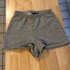 Super Comfy Sweat Shorts Or Pajama Shorts Never Worn Size 2- Not Very Stretchy Casual Stretch Short Bottoms, Casual Stretch Short Pants, Casual Gray Bottoms With Short Inseam, Casual Gray Bottoms For Day Out, Casual Gray High-waisted Shorts, Stretch Short Bottoms For Day Out, Stretch Shorts For Day Out, Casual Gray Short Bottoms, Gray Casual Short Bottoms