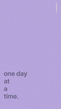 a purple poster with the words one day at a time