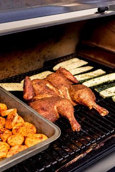 some food is cooking on the grill in the open air, while other foods are being cooked