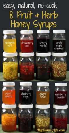 eight jars filled with different types of fruit and herb syrups