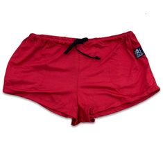 Red White Blue Apparel custom lounge shorts are made right here in the USA using a super soft flowy fabric! These shorts were built for lounging around the house. They are so light and soft, you may wonder if they're still on! Details: Simple shorts, draw string, elastic in back half of waist. Front pockets, clean fit Longest in center, tapers up to side of leg Tri-blend material with spandex RWB tag on the left pocket NOTE: Waist openings will vary depending on how much fabric is bunched with t Camo And Red, Flowy Fabric, Woodland Camo, Lounge Pajamas, Stay Humble, Lounge Shorts, Pink Camo, Gray Plaid, Pajama Shorts