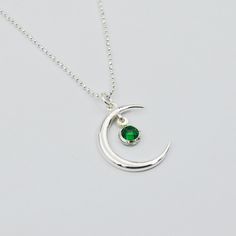 Are you looking for the perfect gift idea for your mother, sister, daughter, girlfriend or wife? We present to you a necklace with a moon and a synthetic emerald, saphire, ruby or zirkon. It's the perfect gift for any occasion, such as birthdays, Confirmation, First Holy Communion, wedding anniversary and many more! ❤️ Each product purchased in our store is packed in a decorative box for FREE! 🎁 ❗️ All our products are made of the highest quality 925 silver. ❗️ 🏷️ Handmade jewelry 🏷️ The prod Silver Emerald Gemstone Necklace, Spiritual Round Jewelry Gift For Mom, Sterling Silver Moon Charm Jewelry Gift For Her, Sterling Silver Jewelry For Birthday Gift, Silver Emerald Pendant Necklace As Gift, Spiritual Pendant Jewelry For Birthday Gift, Sterling Silver Jewelry With Moon Charm For Anniversary, Sterling Silver Crescent Spiritual Jewelry, Round Moon Charm Jewelry For Mother's Day