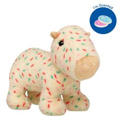 a small stuffed animal with sprinkles on it