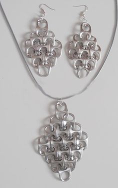 a necklace and earring set made out of metal