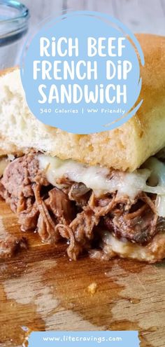 a close up of a sandwich on a cutting board with the words rich beef french dip sandwich