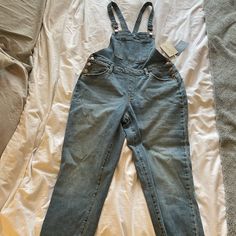 Universal Thread Straight Leg Denim Overalls Size 6. New With Tags. Raw Edge Opening. Stretch Denim. Rose Gold Accents And Button Along Each Side. High Rise Overalls In Medium Wash With Button Closure, High Rise Medium Wash Overalls With Button Closure, Denim Blue High Rise Overalls With Button Closure, Light Wash Denim Overalls With Button Closure, Light Wash Denim Jumpsuit With Straight Leg, Mid-rise Medium Wash Denim Jumpsuit, High Rise Washed Blue Denim Overalls, Medium Wash Denim Jumpsuit With Straight Leg, High Rise Denim Overalls With Button Closure