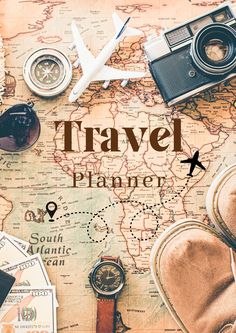 a map with the words travel planner on it and various items laid out next to it