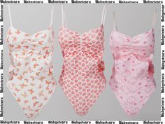 three different types of swimsuits hanging on a line