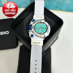 Title;CASIO JG-310-4T Cyber Max  Japanese Digital Watch Rare Vintage  Very Good Condition  ✔️ ✈🎁 Fast shipping UPS Express (Europe 2-3 days) (America 3-5 days) (Australia 5-8 days) (Canada-4-8 days) ✔️  Brand: Casio ✔️   Model: JG-310-4T ✔️  Case Diameter: 43mm  ✔️  Strap Width: 19± 20 MM  ✔️  Strap Color: White ✔️  Dial Color: White ✔️  Strap Material : Nato Quality Strap ✔️  Case Material: Resin   ⏰ Casio Cyber Max JG-310 is a very special collection. Very good condition. Only the strap has been changed. The price has been determined accordingly. Fast shipping will be made with UPS cargo. It will be shipped with fast UPS cargo. 🚚 Make sure your contact and Address information is accurate, Thank you. ☎📞 In some cases, telephone information may be required during cargo delivery. If you White Dial, Wristwatch Men, 8 Days, Wrist Watches, Digital Watch, Halloween Shopping, Wrist Watch, Jewelry Watches, Color White