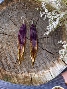 "These long purple fringe beaded earrings are made of high quality Czech beads. Colors: purple, sparkle brown, sparkle gold. -------------------------------------------- ✦ The Details: ✔ Made with quality Czech beads ✔ Made using strong bead weaving thread. ✔ Lenght: app.4.5 inches ✔ Stainless steel earrings hooks There may be some color discrepancies which is due to the different monitor settings ✦ All earrings hooks are nickel and lead free! ✦ More great boho earrings found here https://www.et Purple Fringe Beaded Earrings As Gift, Purple Fringe Beaded Earrings For Gift, Purple Beaded Fringe Drop Earrings, Purple Beaded Fringe Earrings For Gift, Purple Beaded Earrings With Tassels For Gift, Purple Dangle Tassel Earrings With Fringe, Purple Dangle Tassel Jewelry, Purple Dangle Jewelry With Tassels, Purple Fringe Tassel Earrings Gift