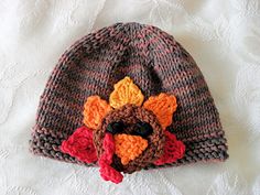 a crocheted turkey hat is shown on a white sheet with the words pattern written below it