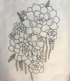 a drawing of some flowers on a white sheet with chains hanging from it's sides