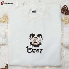 Introducing our Best Friend Mickey Embroidered T-shirt, a perfect blend of style and nostalgia. This Disney Characters Embroidered T-shirt is a must-have for any Disney enthusiast. Impeccably designed with intricate embroidery, it showcases Mickey and his best friends in all their glory. With its high-quality fabric, this T-shirt offers exceptional comfort and durability. Its vibrant colors and detailed embroidery add a touch of magic to your outfit, making you stand out in any crowd. Whether yo Disney Best Friends, Disney Theme Party, Hawaiian Shirt Women, Detailed Embroidery, Linen Fashion, Intricate Embroidery, Outfit Making, Polo Shirt Women, Embroidered Tshirt