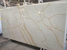 a large white marble slab in a warehouse