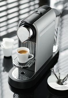 an espresso machine sitting on top of a table