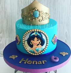 the cake is decorated with an image of princess pocahon and her name on it