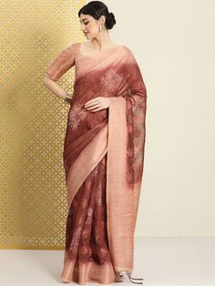 Brown and pink sareeEthnic motifs woven design saree with woven design border Has zari detailThe saree comes with an unstitched blouse pieceThe blouse worn by the model might be for modelling purpose only. Check the image of the blouse piece to understand how the actual blouse piece looks like. Festive Pre-draped Saree With Printed Border, Designer Wear Saree With Printed Border For Eid, Transitional Season Unstitched Saree, Eid Semi-stitched Saree, Cotton Silk Saree With Printed Border, Slub Silk Saree With Detailed Pallu, Pre-draped Saree With Printed Border For Puja, Pre-draped Semi-stitched Saree With Printed Border, Self Design Saree For Diwali