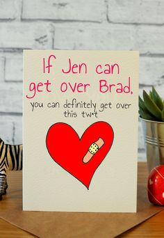 a card that says if you can get over brad, you can definitely get over this heart