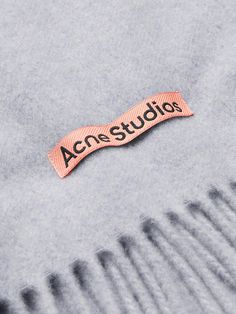 Acne Studios' iconic fringed scarf is practically an essential of the cool winter wardrobe. It has been knitted in Italy from RWS-certified wool and detailed with the house's logo tab. Cool Winter Wardrobe, Scarf For Men, Cool Winter, Acne Shop, Ultimate Gift Guide, Scarf Men, Home Logo, The Ultimate Gift, Studio S